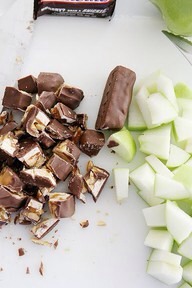Leftover snickers bars from Halloween make a delicious dessert. Simply chop them up with the food chopper. Peel, core and slice a few apples. Place them in a baking dish and sprinkle the chopped candy bars over the apples. Bake at 350 for 15 minutes!!! Serve alone or with vanilla ice cream. Yummy! ‘