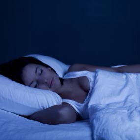 Don't sleep with a light on, this makes it harder to fall asleep making it harder to get up in the morning. If you don't like the feeling of sleeping in the dark, get a night light for comfort