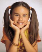 So first start out by splitting your hair into 2 pigtails