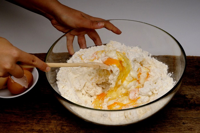 Add pumpkin, cinnamon, cloves and nutmeg to the remaining batter and stir gently until well blended. Carefully spread over the batter in the crust.
Bake in preheated oven for 35 to 40 minutes, or until center is almost set. Allow to cool, then refrigerate for 3 hours or overnight. Cover with whipped