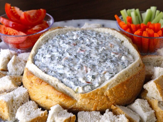 If you want to give your appetizer a fun look, then buy a round bread. Take some bread put from the centre, but try to leave 1/2 an inch of bread on the sides to avoid spilling .