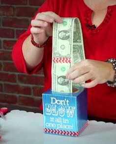 Maybe Money or you can empty a tissue box and tape some dollar bills or whatever you want in it!💵
