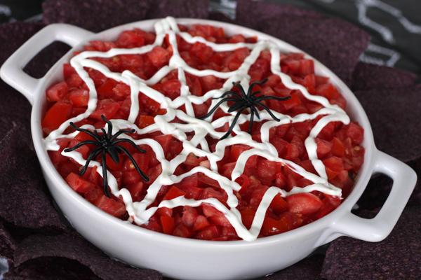 Spider Web Dip

Just some 7-layer dip, with a sour cream spider web on top.