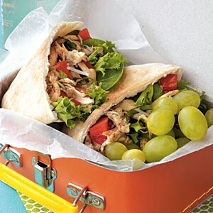 Little Italy Chicken Pitas

 smart trick to this zesty sandwich is using oil from the sun-dried tomatoes to prepare the vinaigrette. Prepare the chicken filling ahead of time and pack separately. Fill pitas just before eating.