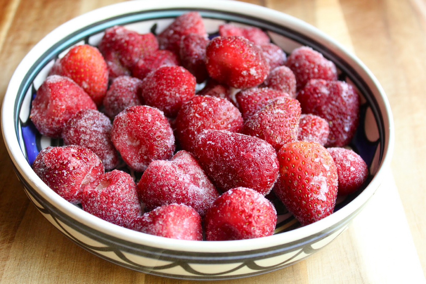 Pop a few strawberries in the freezer to add you a drink not only to keep it cool but to add flavour.