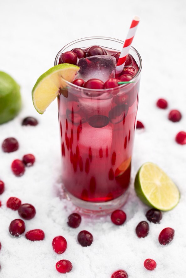 Directions:
Add the vodka into a 16-ounce tall glass. Now add a handful of cranberries and a couple lime slices. Add the ice on top.
Pour in the cranberry juice followed by the club soda.
Add a squeeze of lime juice (if desired) and agave to taste. Stir to combine.
Enjoy immediately!
