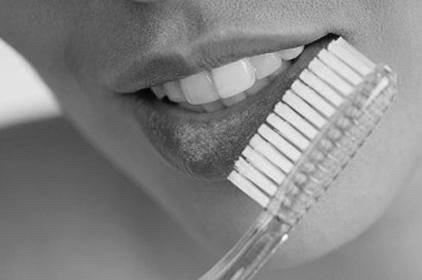 Start scrubbing your lips with a toothbrush (I wet my toothbrush to do this)