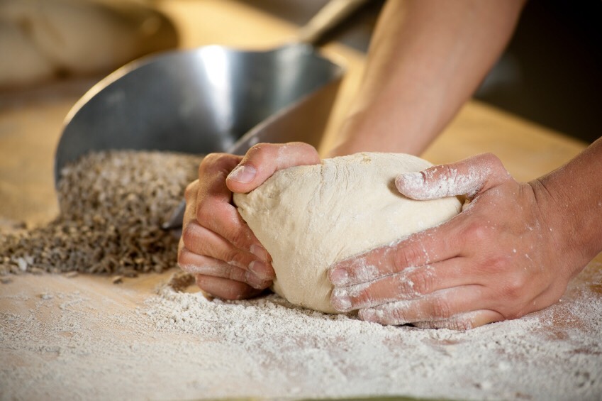 On lightly floured surface, knead dough about 5 minutes or until smooth and elastic. Grease large bowl with shortening or spray with cooking spray. Place dough in bowl, turning dough to grease all sides.