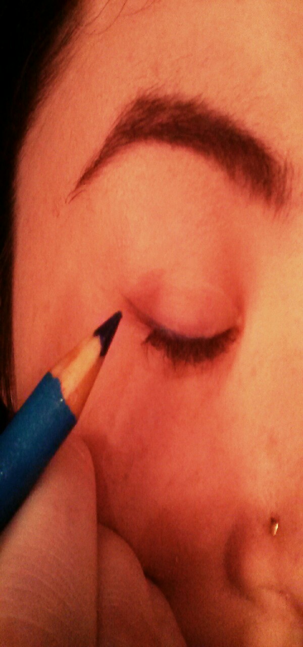 Line your eyes. You may have to apply a couple coats. Wait for each coat to dry before applying another coat.
