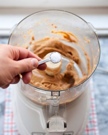 Now sprinkle the salt, oil and sweetener and any other extracts over the top of the peanut butter
