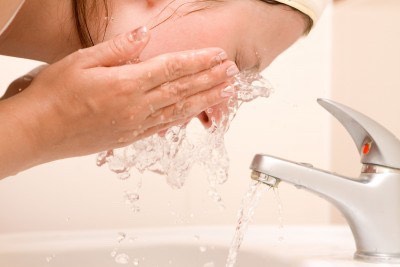 Rinse your face. 