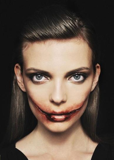 26.  Depict wounds at the two sides of your lips and team it with smoky eye makeup to get a fearful appearance at Halloween.