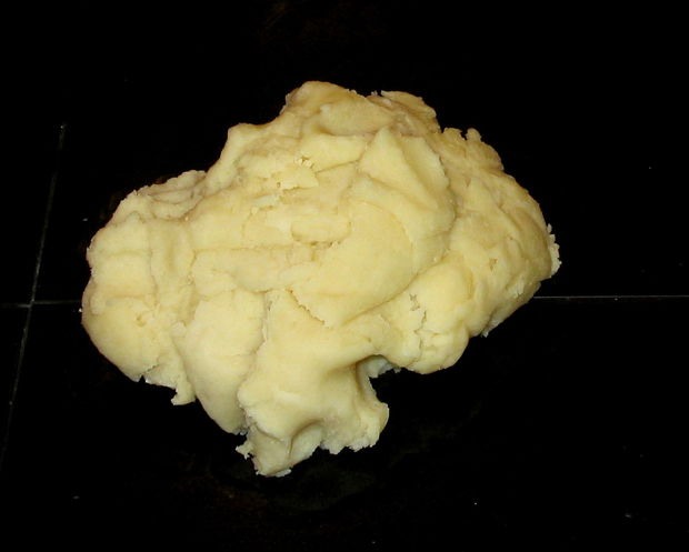 Turn the dough out onto a clean counter or silicone mat, and knead vigorously until it becomes silky-smooth. Divide the dough into balls for coloring.
