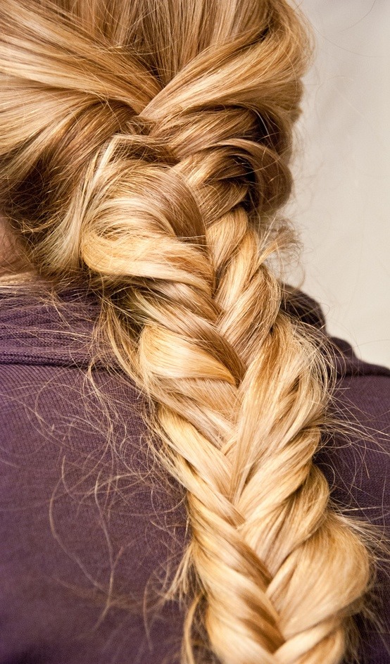To get your braid to last all day, try styling hair that’s “dirty with product." This will make the style stick longer.