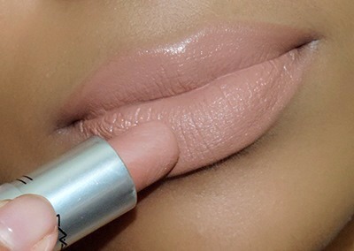 DAB ON NUDE LIPSTICK

Dab on a warm-toned lipstick (those look good on ALL skin tones).
