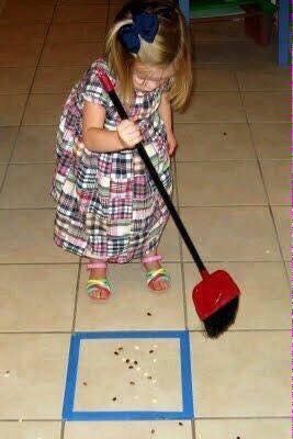 Put tape a square on the floor so kids can help sweep and it will be a bit of a game for them.