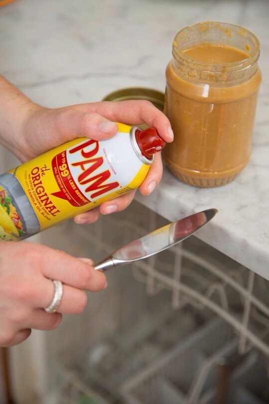 Whatever you're prepping, spray PAM over your open dishwasher — it'll catch the excess so your floor won't.