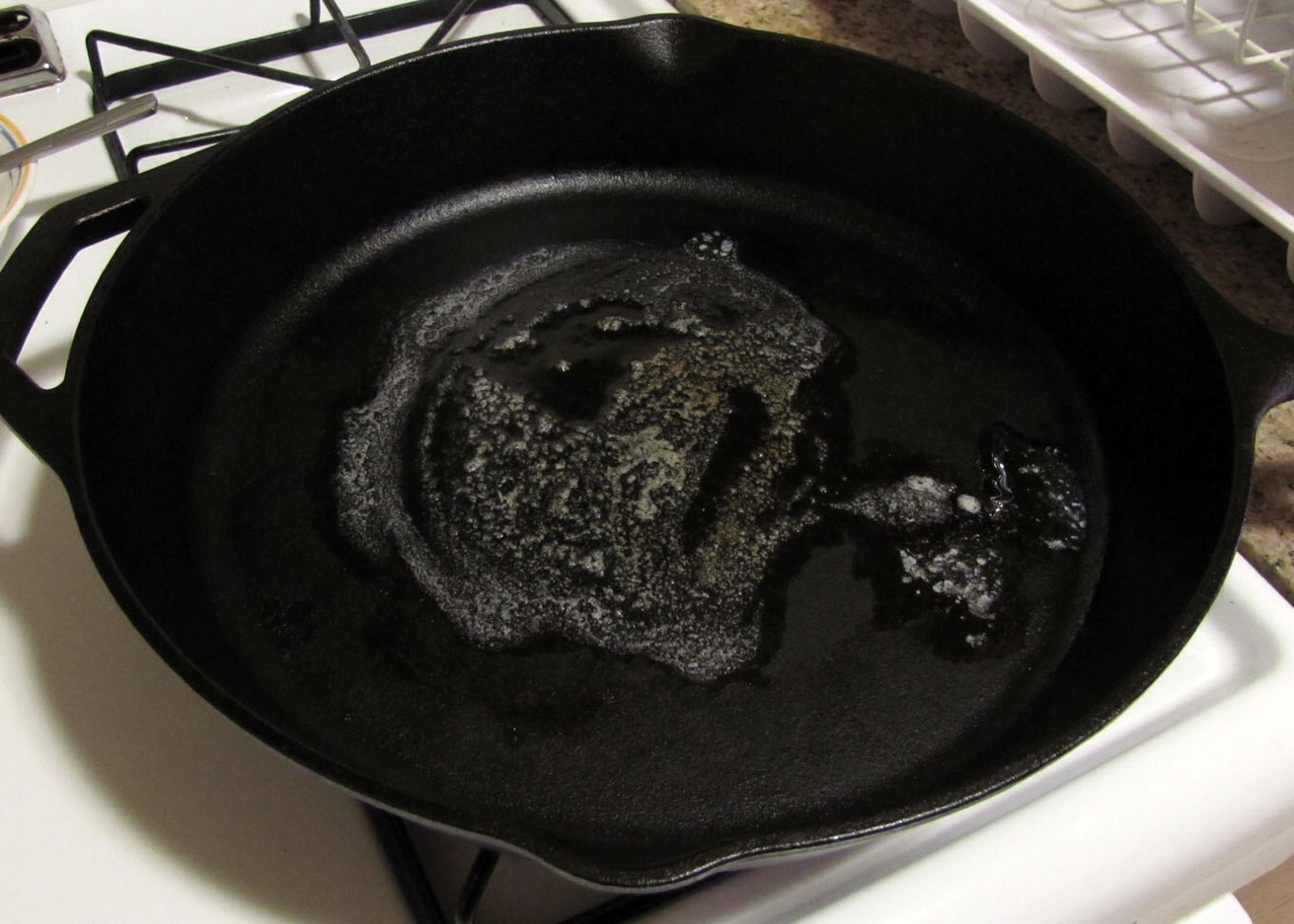 Place skillet over medium heat. Add melted butter