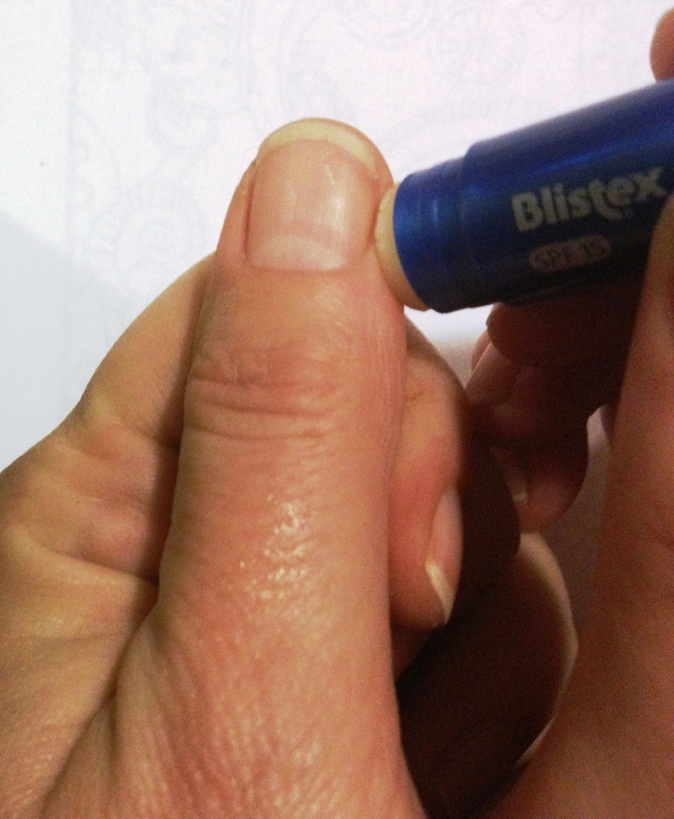 • Lip balm
If you're out and about and your cuticles are bothering you, have a look in your bag for a stick of lip balm and try rubbing a little on your cuticles. It should provide some temporary relief until you can get your hands on some hand cream.