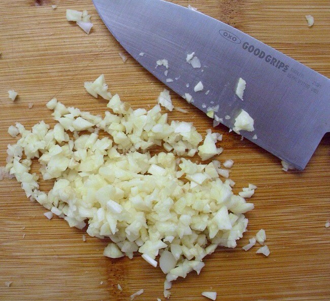 Chopped garlic! This will help grow your nails out and make them strong and healthy so they won't break