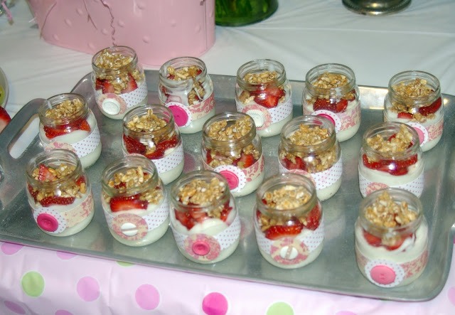 Mason jar pastries decorated with ribbons and buttons - try a cheesecake recipe.
