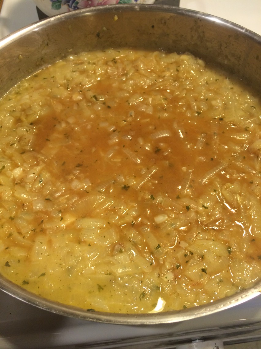 Add the beef bouillon cubes & cup of water to onions + 1/2 cup of water. The flour will stick to bottom of pan, that's supposed to happen. After you put water in, scrape the bottom of the pan until the browned flour comes up & mix in. Continue to cook on low for 30 minutes. 