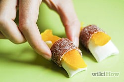 Wrap the ends of the Fruit by the Foot around the fish and donut (or marshmallow)