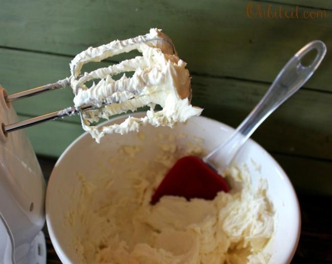 Directions:
Unroll one of the cans of the Crescent dough and press it onto the bottom of a greased 13×9″ baking pan, to form a bottom crust.  Firmly press the seams together to seal.
With a hand mixture, beat the Cream Cheese, Vanilla, Egg and 1/2 cup of the Sugar on medium speed until well blended…