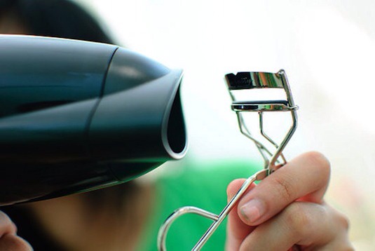 14. Heat Your Lash Curler
Hold a blow dryer up next to your lash curler for about 3-5 seconds. The heat works the same way as it does with your curling iron, giving you those flirty lashes that will last all day.