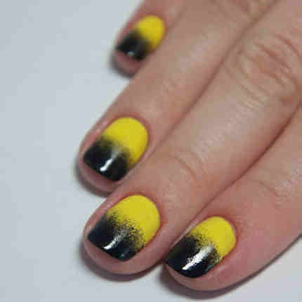 2. Using your preferred method, create a black to yellow gradient on the nails. To do this, you can get a makeup sponge to blend the colors together. (Cult Nails Nevermore)