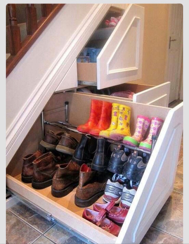 Awesome shoe storage underneath stairs case. So convenient. 