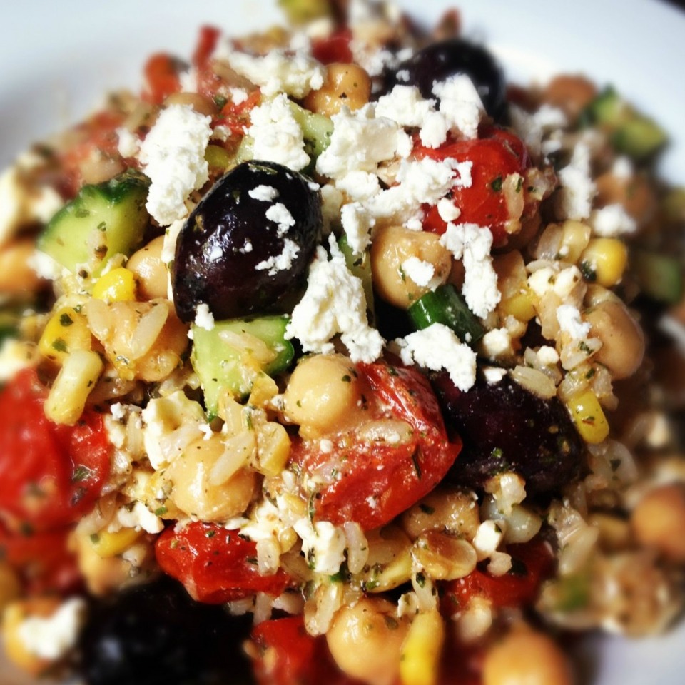 41. Greek Rice Salad Whisk olive oil, lemon juice, salt and allspice. Toss with chopped cucumber and tomato, scallions, parsley, dill, mint and lemon zest. Stir in cooked rice and a dash of hot sauce; top with feta.