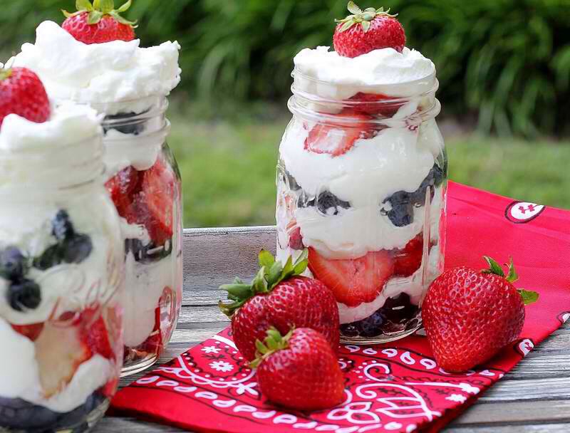 Whip cream , strawberries , and blue berries , yum :)