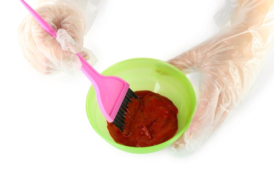 Get a bowl and brush. 

Mix equal parts hair dye and 30 developer.