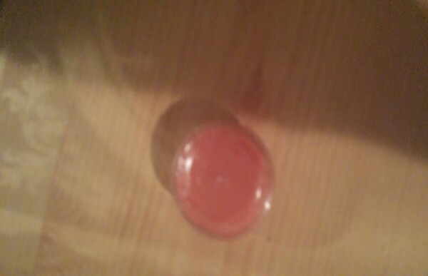 a glossy clear lip gloss or balm 