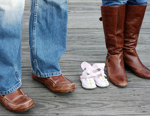 Family Photo

Have a picture taken of your feet, your partner's and an empty pair of baby girl or baby boy shoes.