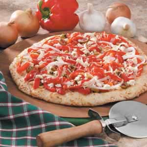 
5. Roasted Pepper Make Margherita Pizzas add roasted pepper strips and red pepper flakes with the cheese.