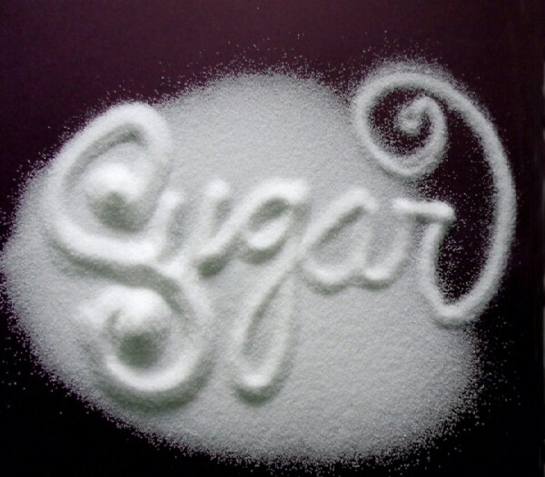 then, put half a spoonful of sugar in the bowl and stir together.