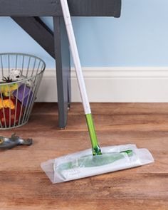 Wax Paper as Floor Cleaner Use this kitchen staple to pick up dirt and dust. Rip off a piece roughly the size of your sweeper and attach it just as you would a cleaning cloth. As you sweep highly trafficked or dirty areas, the gunk sticks. Wax on, dirt off.