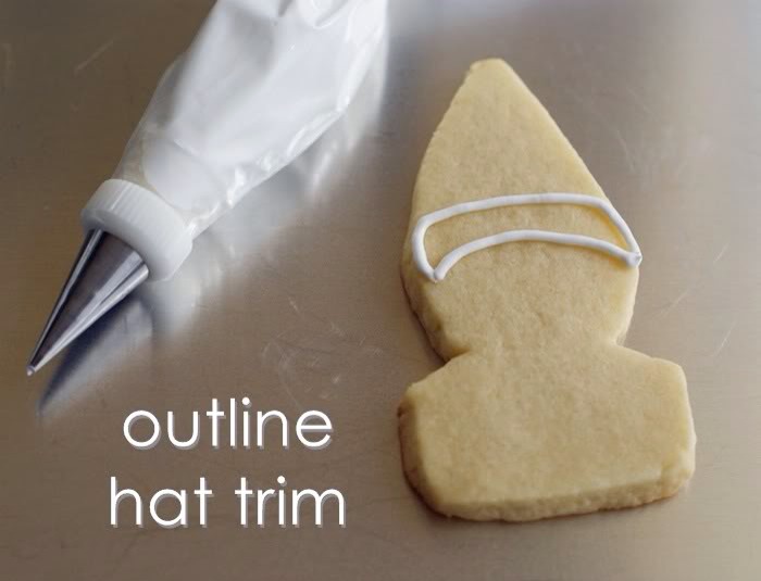 Use a #2 tip to outline the hat trim in white. 
