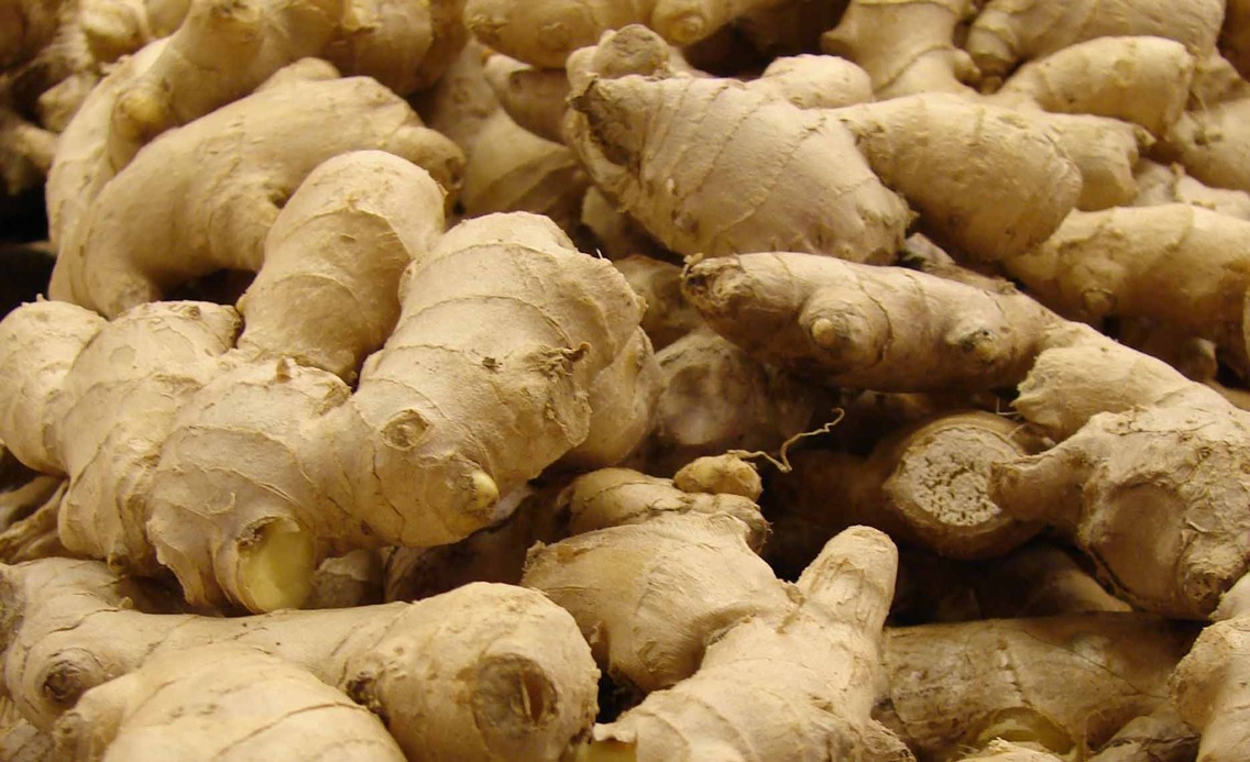 Peel that papery skin from ginger.
Ditch the peeler in favor of a spoon to peel finicky ginger root.
