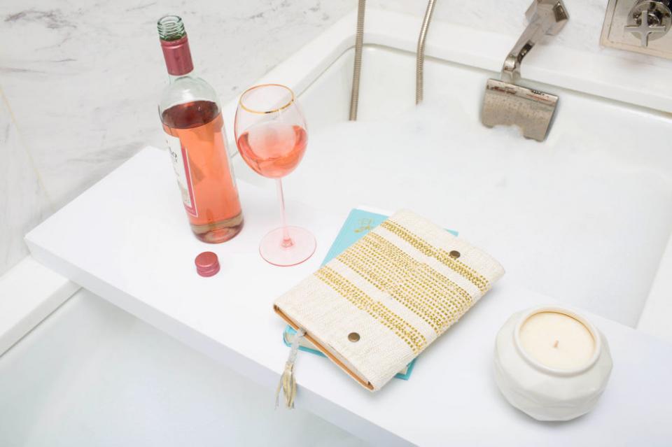 4. Use an old wall shelf as a bathtub caddy shelf. Amp up your bathroom style with this amazing, inexpensive way to unwind at the end of the day.