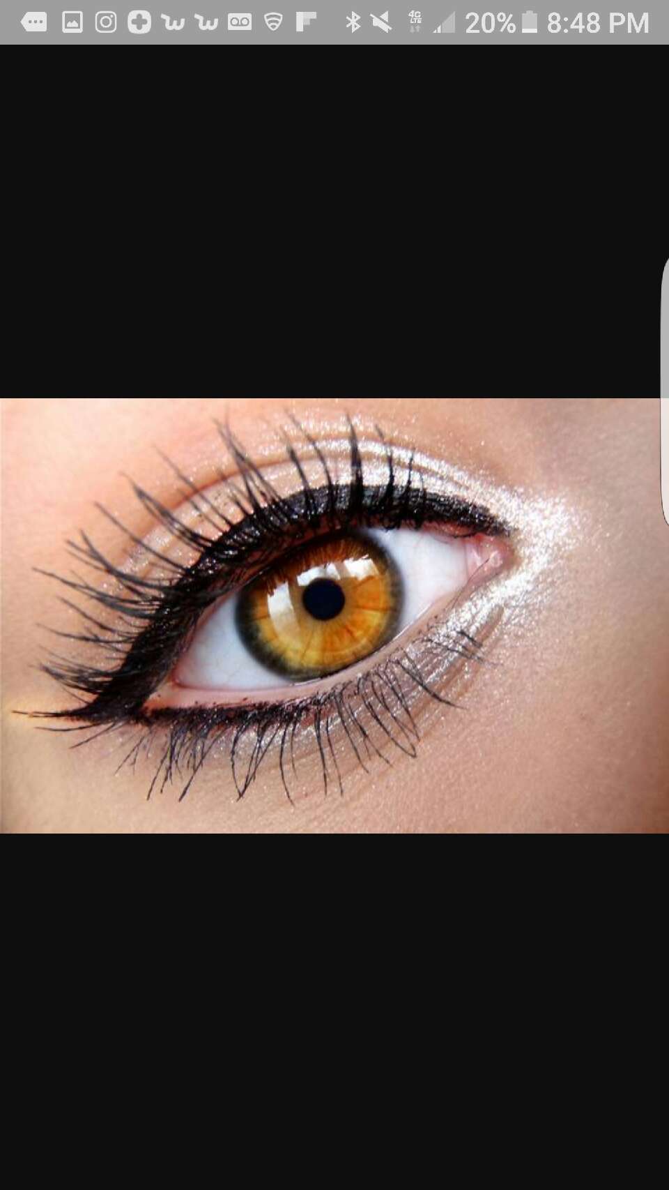 long separated lashes and a pop of white shimmer in the inner cornner