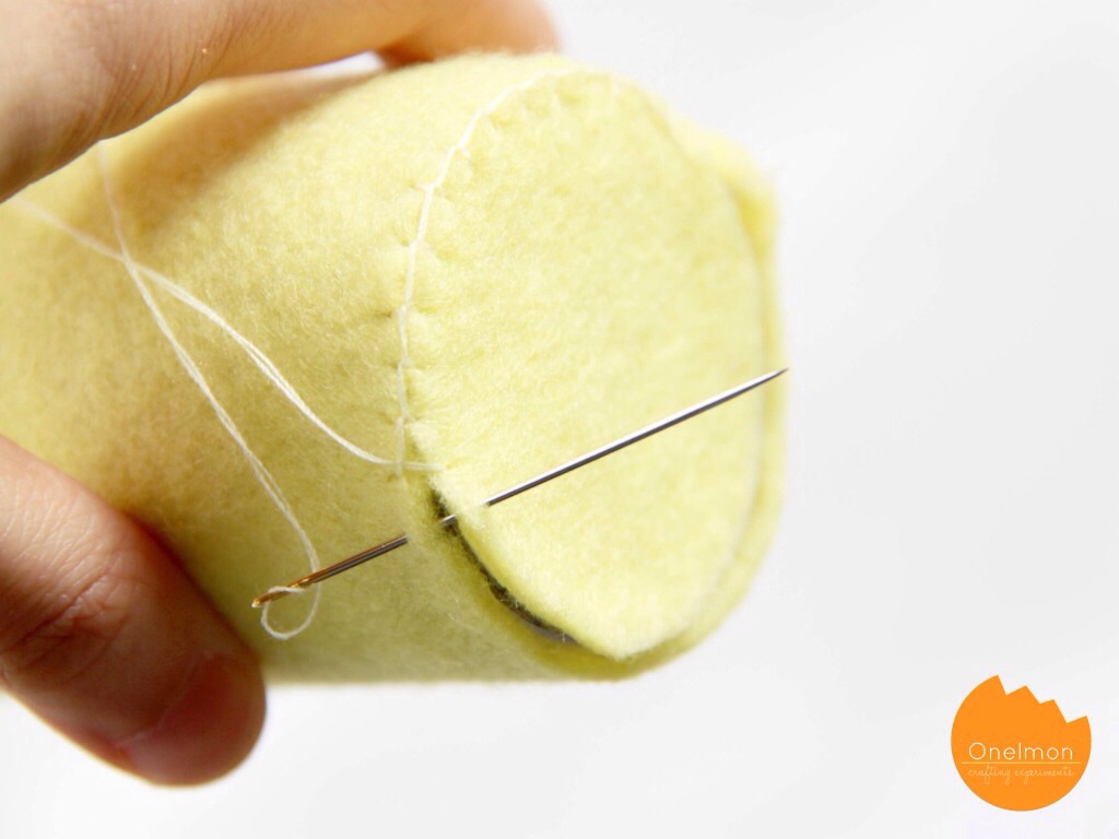 Don't forget to sew the bottom of the case with another piece of circle felt.