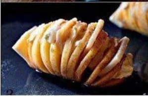 4. Slice the butter and the Parmesan 
5. Next, open the potatoes’ crevices and shove the Parmesan and butter, alternating between the two. “”Tip: It helps to put butter in freezer for awhile before cutting it.