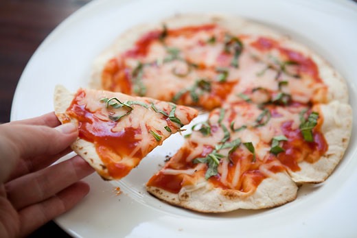 Pizza wrap
• Food wrap (pita, tortilla, spinach wrap etc.)
• Tomato sauce
• Cheese
