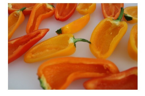 Preheat oven to 350.
Split peppers lengthwise and remove seeds and all extras to make a smooth surface inside.Brown ground beef and drain.
Add garlic powder, onion powder, Worcestershire and ketchup to skillet.
Cook until heated through.
Add rice and mix everything together well.