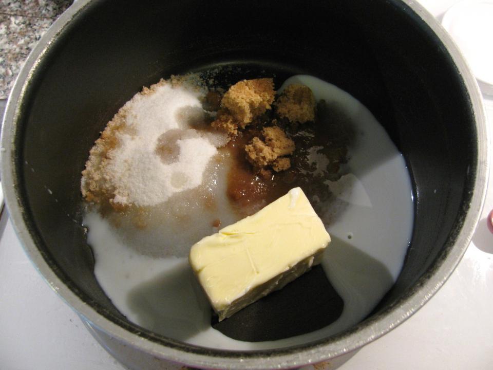 
 Melt the butter, the sugars and milk in over medium heat in a saucepan.