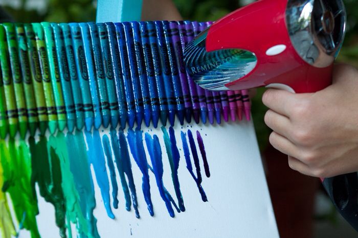 Once stuck down securely, melt with a hair dryer. Make sure you melt you crayons downward or if doing a heart move the canvas around and melt downward.