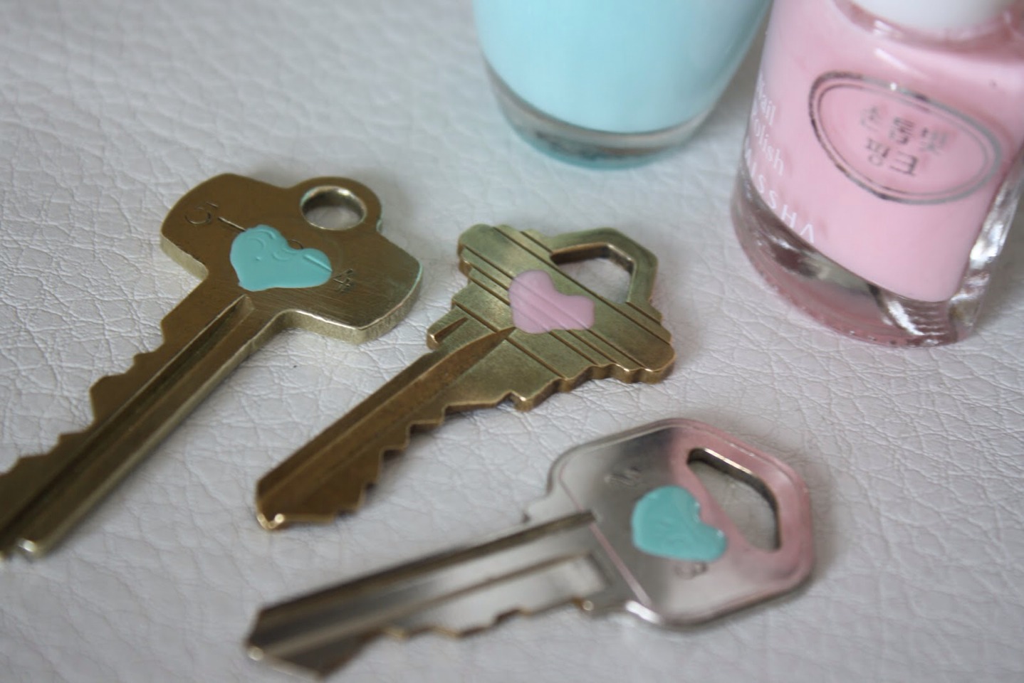 Paint your keys with nail polish to easily distinguish the set helps when you lend it too a houseguest 